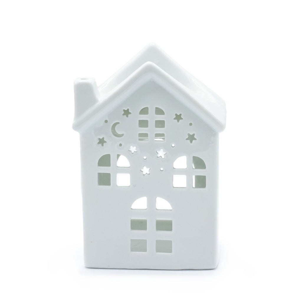Cosy ceramic house‑shaped oil burner for wax melts and fragrance oils