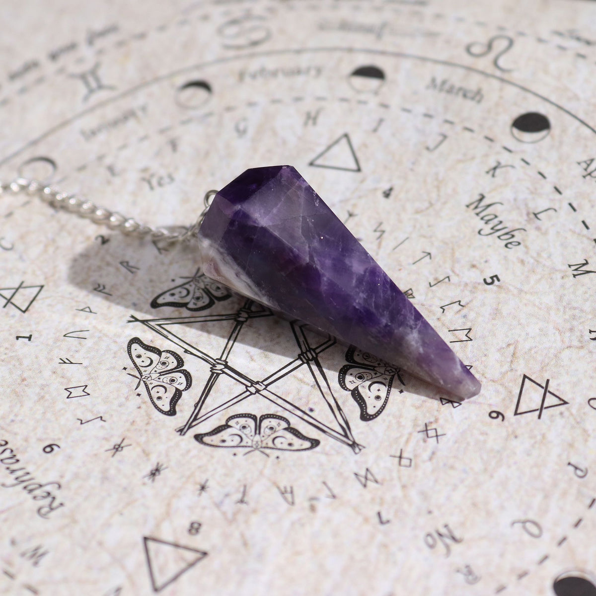 Seduction witch spell incense with amethyst pendulum – attraction and sensual energy ritual